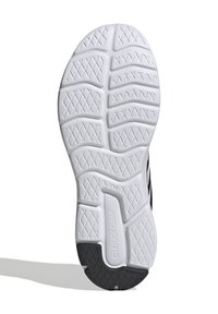 Sort og hvid sneakersål med tekstureret gummi, mønstrede greb, præget "CLOUDfoam" og "ADIWEAR" branding.