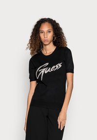 Guess ODETTA - T-shirt estampada - jet black