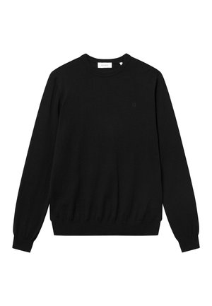 Svart sweatshirt laget av mykt stoff, med rund hals og ribbede mansjetter og nederkant, samt en minimalistisk logodetalj på brystet.