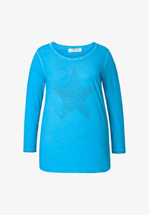 Tyrkysové tričko s dlouhým rukávem, které má uprostřed design hvězdy z kamenů, kulatý výstřih a volný střih.