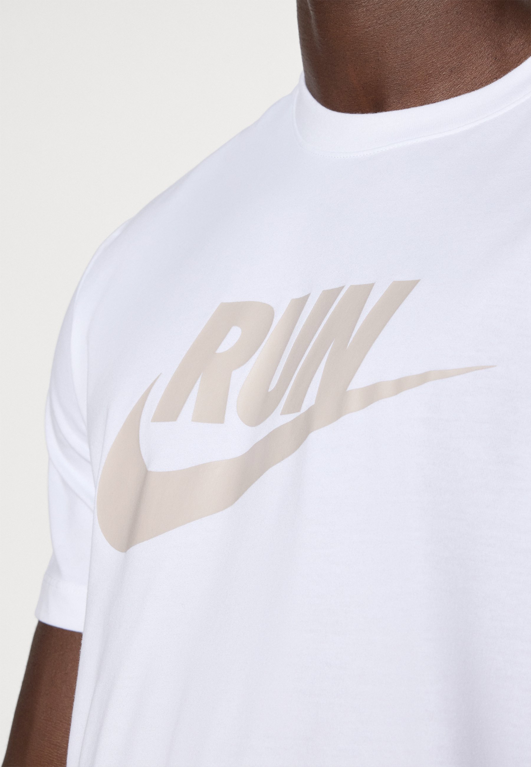 particle beige nike shirt