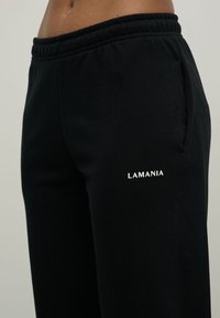 LA MANIA SEASON - Tepláky - black