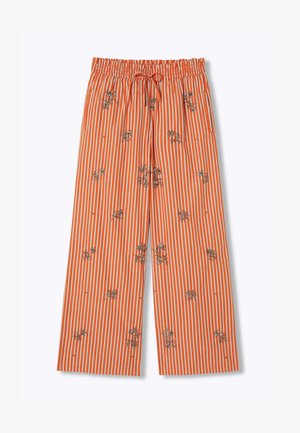 Pantalon ample à rayures verticales orange et blanc, avec une taille élastique, un cordon de serrage et des motifs floraux brodés dispersés.