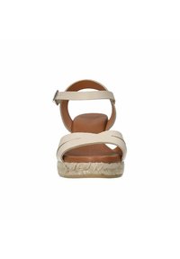 Beige Leder-Espadrillesandalen mit überkreuzten Riemen und Knöchelriemen. Mit einem Jute-umschlossenen Keilabsatz und einer glatten, braunen Innensohle.