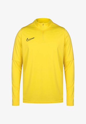 Geel sportshirt met lange mouwen en een ritskraag, gemaakt van gladde, lichte stof; heeft een zwart Nike-logo op de borst.