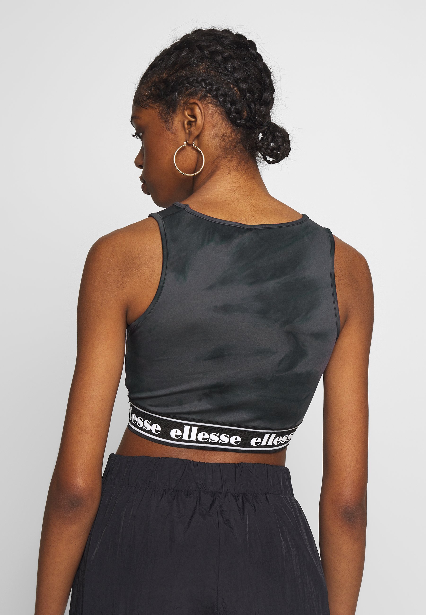 Ellesse FENZO Topper black Zalando.no Ellesse GOZZI X SMILEY - Topper - black