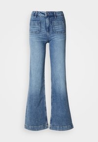 Visoke jeans s razširjenim hlačnicami v svetlo modrem denimu, z dvema zadnjima žepoma, surovim robom in subtilnim bledenjem na stegna. Klasičen petžepni dizajn.