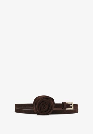 Brown suede belt with a rose-shaped accent, featuring a smooth texture and metallic buckle. Two narrow straps form the belt.
