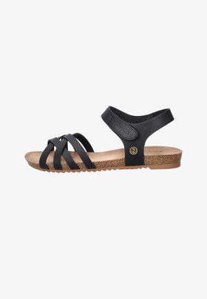Black flat sandal with three front straps, ankle strap with Velcro closure, cork footbed, and rubber sole.