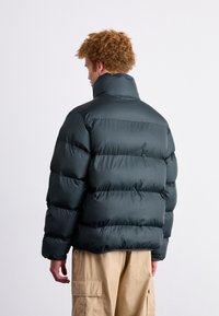 Converse POCKET PUFFER JACKET - Zimska jakna - black