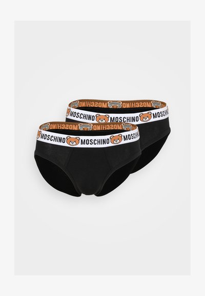 Melnas kokvilnas apakšbikses ar oranžu un baltu Moschino logo jostu, kurā attēlots lācis, ar gludu tekstūru un klasisku dizainu.