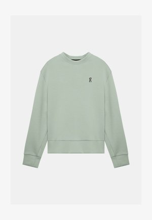 Bluză sport cu mâneci lungi, de culoare verde deschis, cu guler rotund, cu un mic logo negru "on" pe partea stângă a pieptului, manșete și tiv striate.