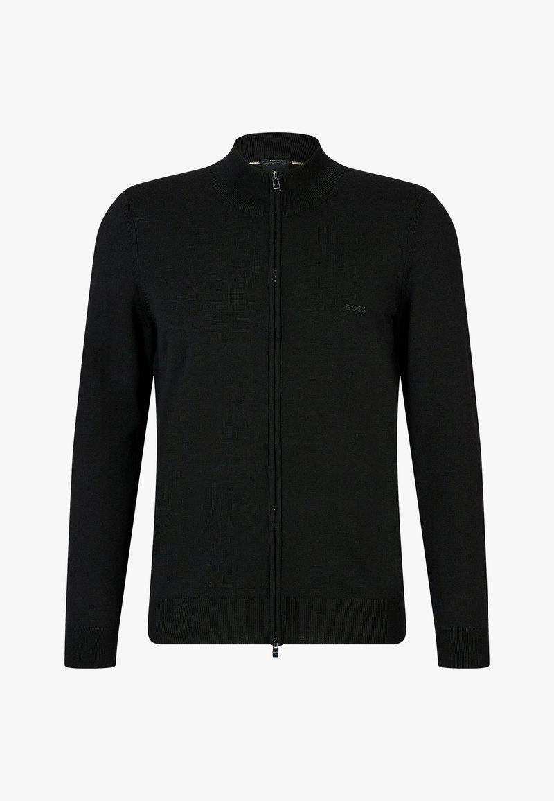 Melnā jaciņa ar rāvējslēdzēju, izgatavota no gludas adīšanas materiāla, ar augstu apkakli, garām piedurknēm un nemanāmu logo detaļu uz krūtīm.