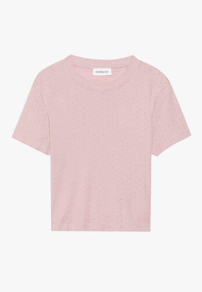 Korte mouwen katoenen T-shirt in lichtroze met een textuur van stippen, ronde halslijn en een relaxte pasvorm. Lichtgewicht en ademend materiaal.
