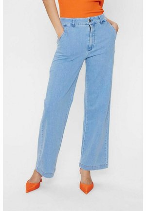Light blue wide-leg jeans feature a high waist, front pockets, and a zip fly. The fabric is smooth denim with a classic finish.