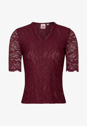 Burgunderfarbenes Spitzenshirt mit V-Ausschnitt und kurzen, gewellten Ärmeln. Filigrane florale Muster über das gesamte Shirt. Verfügt über ein kleines Logo-Detail am Saum.