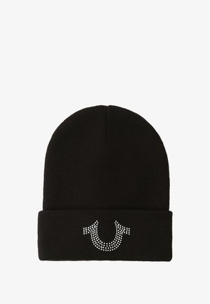 Zwarte gebreide muts met een omgeslagen boord, versierd met een strasssteentjesornament van twee pijlen. Zachte textuur, nauwsluitend ontwerp.