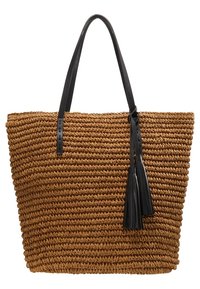 Torba na ramię z plecionej słomy w kolorze beżowym z czarnymi skórzanymi uchwytami i ozdobnym frędzlem. Gładka tekstura, duży otwarty wierzch i przestronny design.