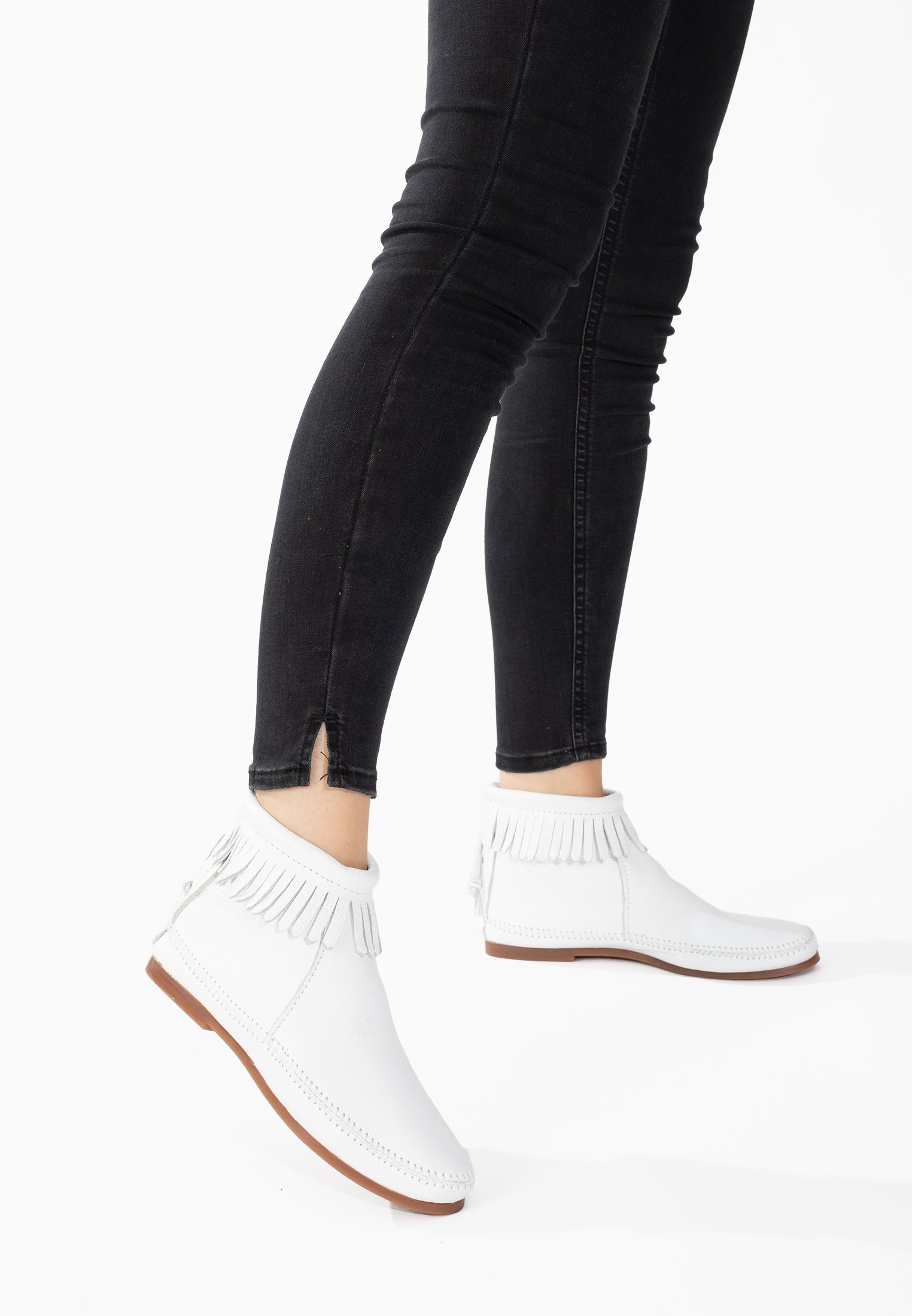white minnetonka boots
