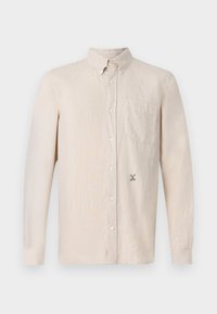 Hellbeige Langarmshirt mit Kragen, Knopfverschluss vorne, einer Brusttasche und dezentem gesticktem Design auf der linken Seite.
