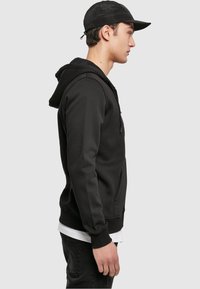 Merchcode Sweatjakke - black