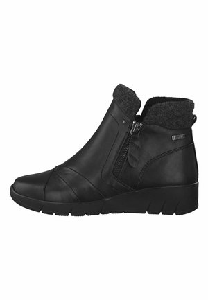 Black leather ankle boots feature a textured fabric collar, side zipper, and a low wedge outsole for added comfort. Curved design at the toe.