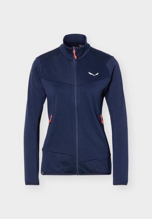 Σκούρο μπλε ζακέτα με φερμουάρ, μακριά μανίκια, ψηλό γιακά, πορτοκαλί τσολιάδες φερμουάρ και μικρό λευκό λογότυπο στο αριστερό μέρος του στήθους.