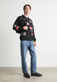 HUGO DANWYLL - Sudadera - black