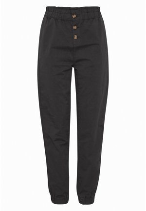 Pantalons noirs avec une taille élastique et une fermeture à bouton à l'avant, présentant des coutures visibles et des poignets élastiques à la cheville.