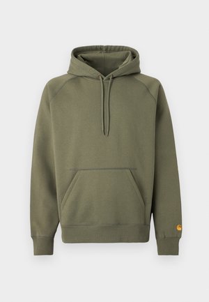 Oljčno zelena kapucar iz mešanice mehke bombažne tkanine z žepom na trebuhu, nastavljivo kapuco z vrvico in rebrastimi manšetami.