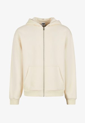 Creme zip-hoodie lavet af blødt stof, med foret hætte, forlommer og ribbede manchetter og kant for en tæt pasform.