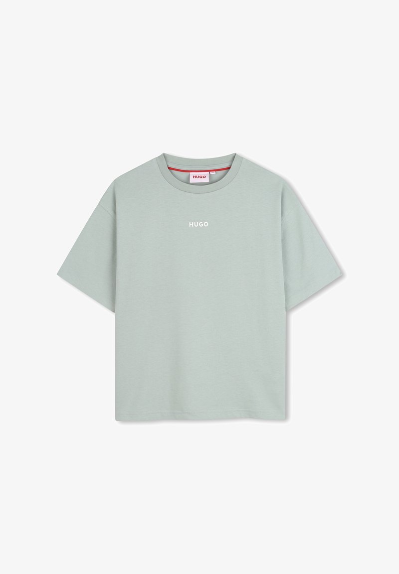 T-shirt verde claro de manga curta em mistura de algodão, com gola redonda e logo sutil "HUGO" em branco no peito.