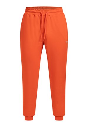 Pantalons de survêtement orange vif avec une taille élastique et un cordon de serrage, des jambes fuselées et des poignets côtelés aux chevilles.