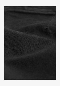 Ausgewählt, black coated