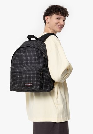 Black backpack with a grid pattern, made of durable fabric, featuring a front zip pocket, adjustable straps, and logo detail.
