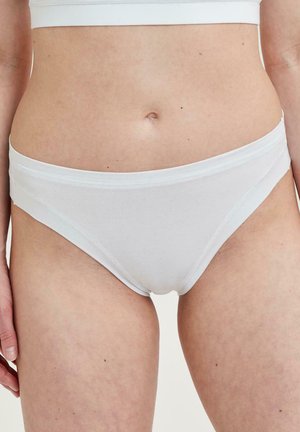 Hvide bomuldsbikini-bleer med en glat tekstur, elastisk talje og minimalistisk design. Ingen mønstre eller synlig branding.