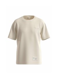 Lichtbeige t-shirt met korte mouwen, gemaakt van een gladde stof. Heeft een borstzak en een label aan de onderzijde links met tekst.
