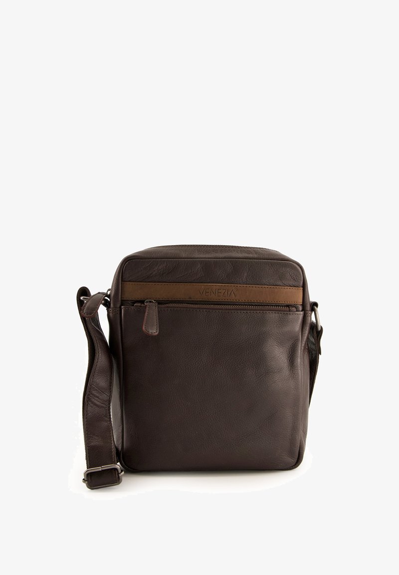 Brown leather crossbody bag with a smooth texture, rectangular shape, top zip closure, and adjustable strap. Features a decorative brown band.