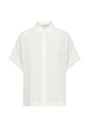 Balta trumpais rankovėmis bluzonė su mygtukų uždarymu, turinti apykaklę ir nėriniais aptrauktas rankoves. Slydžiantis, lengvas audinys.