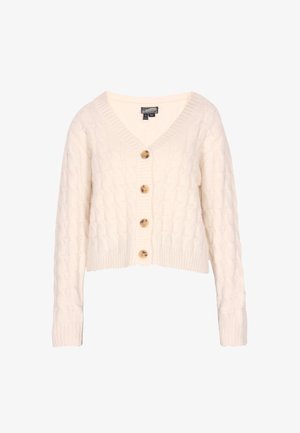 Krēmas krāsas augstpapēžu adījuma kardigans ar V-veida kakla izgriezumu, četriem koka pogām priekšpusē un ribotiem piedurkņu un apakšmalas galiem. Īsas formas dizains.