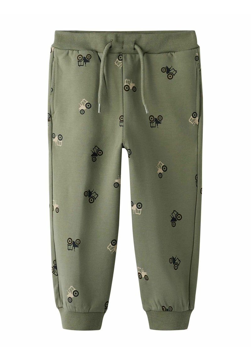 Groene sweatpants met een elastische tailleband en trekkoord. Gemaakt met kleine tractors in zwart en beige. Afgewerkt met boorden bij de enkels.