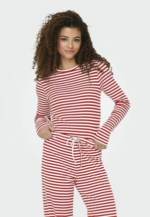 Rood-wit gestreept loungepak met een lange mouw top en broek met trekkoord, voorzien van een relaxed fit en een zachte stofstructuur.