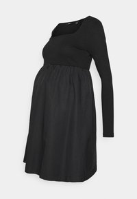 Vestido de maternidade preto com mangas longas caneladas, decote quadrado e cintura franzida. Feito a partir de uma mistura de materiais suaves e flexíveis.