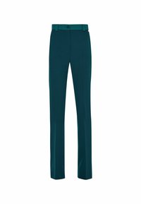 Pantalon sur mesure bleu sarcelle en tissu lisse, avec une coupe droite, une fermeture par bouton et un détail subtil à la taille.