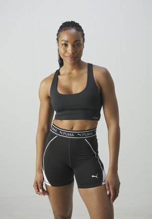 Puma 4KEEPS EVOLVE LONGLINE - Reggiseno sportivo con sostegno medio - black