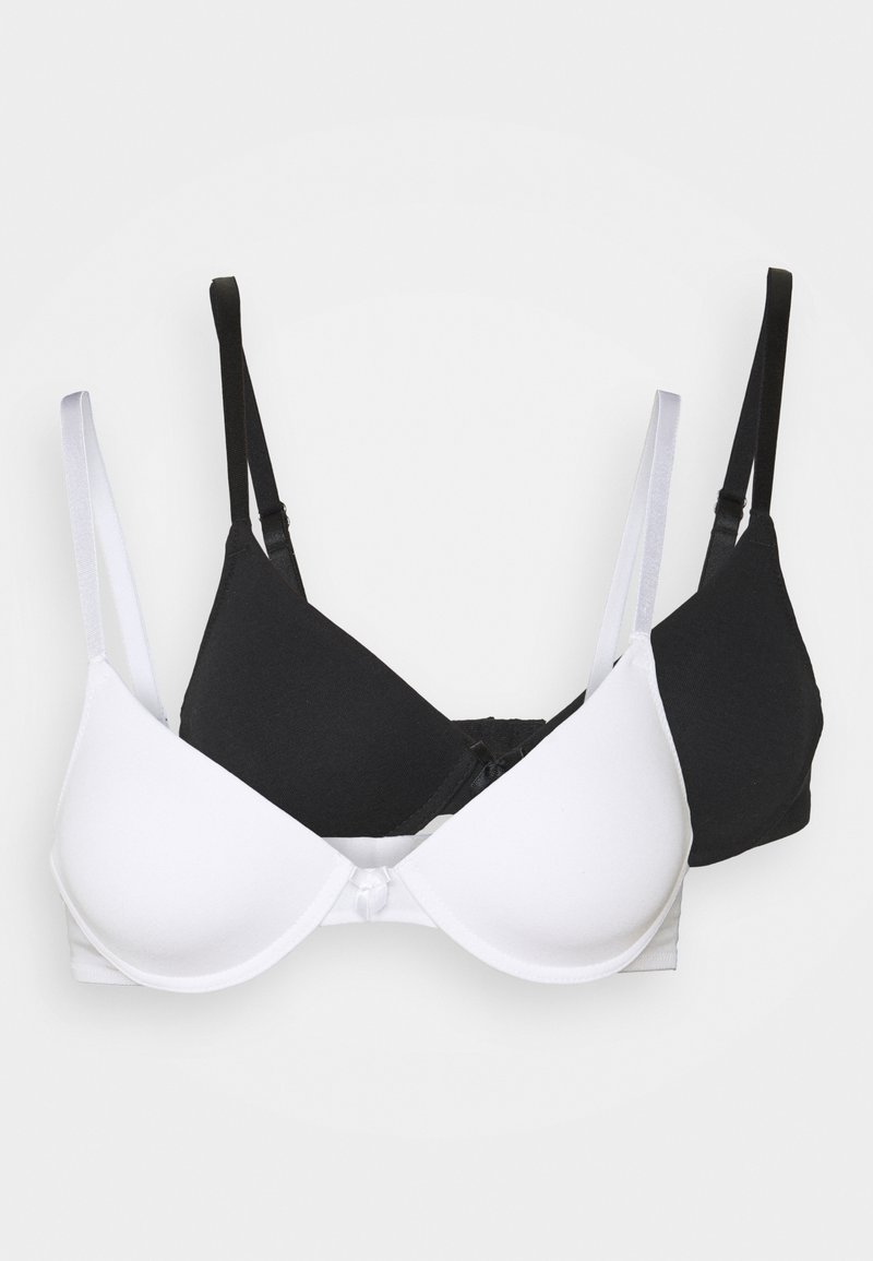 Deux soutiens-gorge empilés, un blanc et un noir. Tous deux présentent un tissu lisse, des bretelles réglables et un design simple sans ornements.