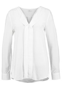 Blouse blanche à manches longues avec un col en V, présentant un pli central et un ourlet légèrement arrondi. Confectionnée dans un tissu lisse et léger.