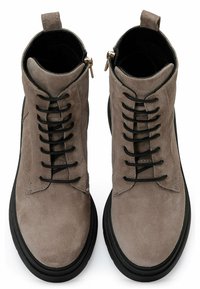 Suede ankle boots in gray with black laces. Features a round toe, black sole, and side zipper for easy wear. Textured finish throughout.