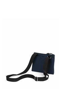 Námořnicky modrá kabelka přes rameno vyrobená z odolné látky, s uzávěrem na zip, nastavitelným černým popruhem a jednoduchým obdélníkovým tvarem.