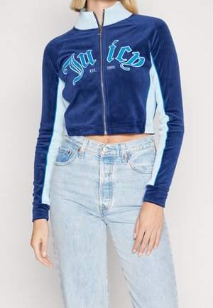 Tröja med dragkedja - light blue